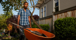 black man working in garden home