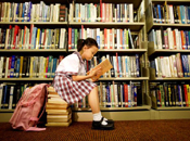 Girl reading in library