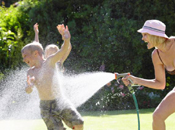 Mother and children in garden