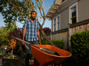 black man working in garden home